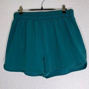 Beyond Yoga Stretch Woven in Stride Liner Shorts in Teal Size Medium